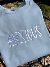 Load image into Gallery viewer, Anxious embroidered sweatshirt | Affirmations on sleeve | Anxiety Crewneck | Mental Health sweatshirt | I am safe, I am loved
